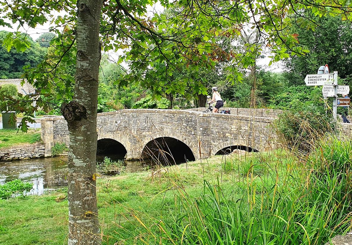 Cycling into Bibury, the Cotswolds