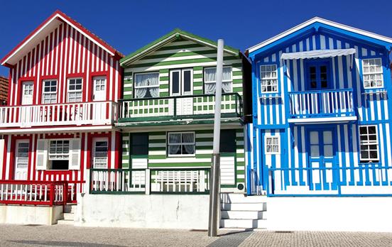Pedal passed charming fishermen's cabins