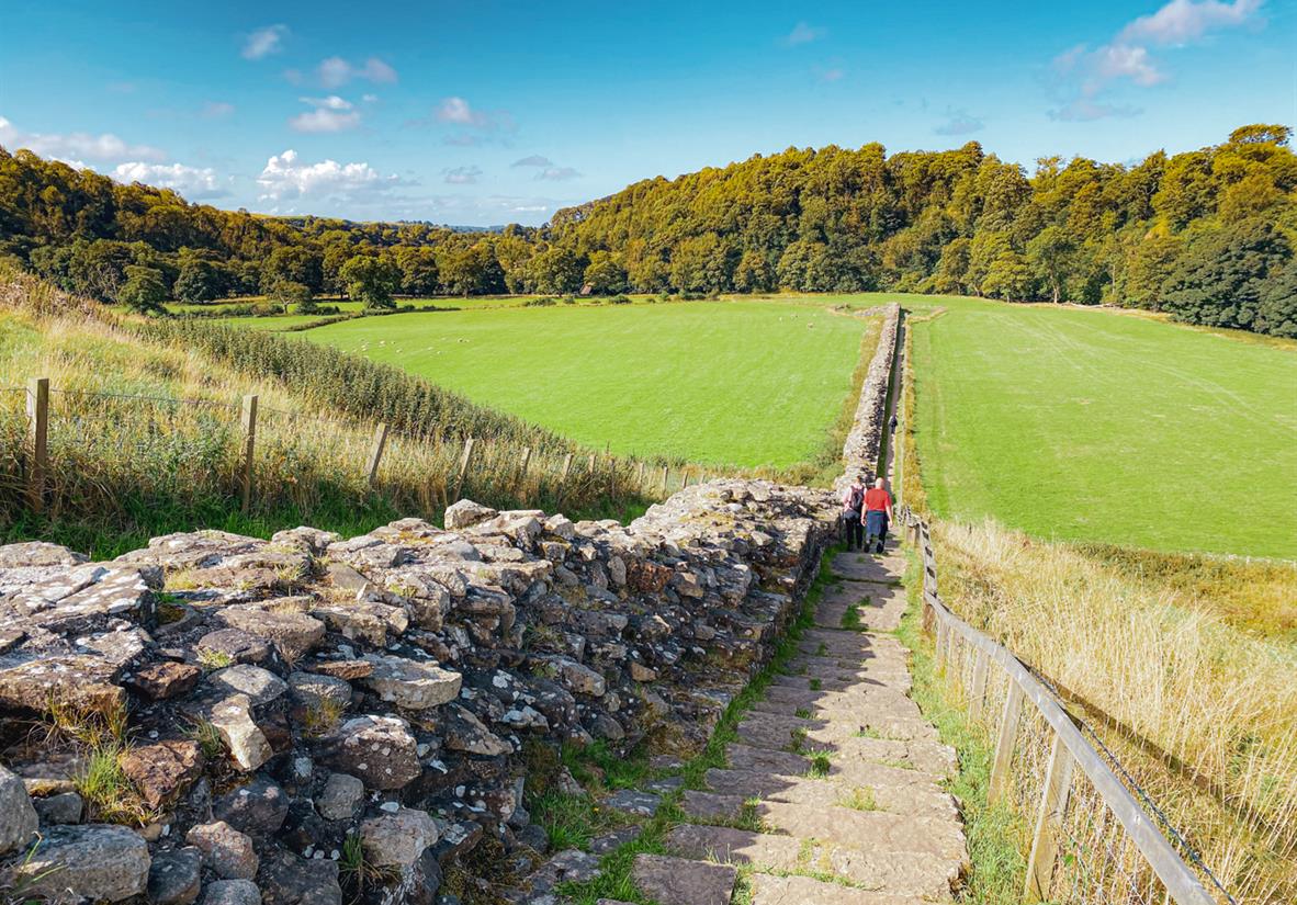 Walk along side large sections of the wall