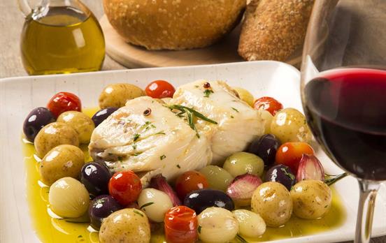 Kosten Sie Portwein und portugiesischen Stockfisch