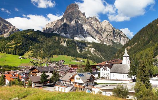 The town of Corvara at the foot of Sassongher