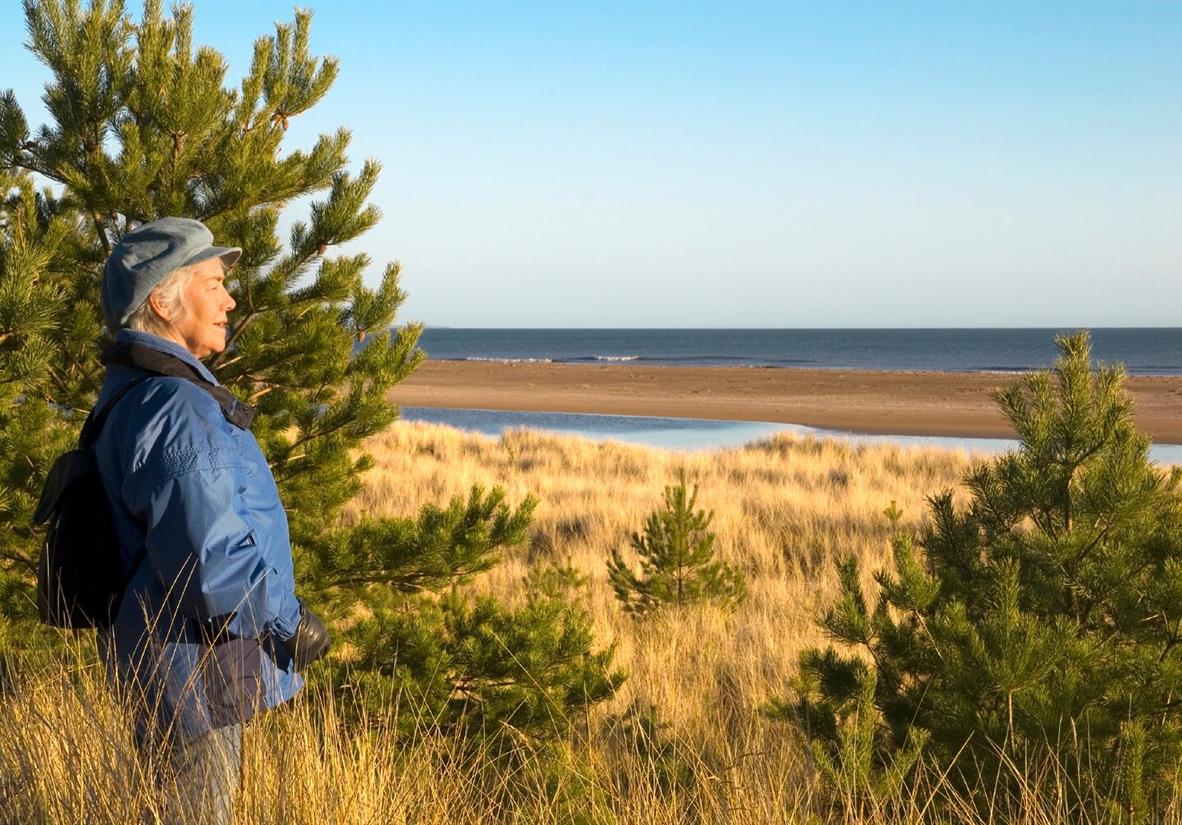 Walker with Scenic View on Fife Coast Path