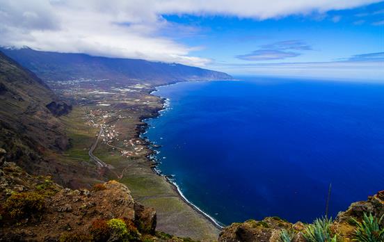 Deep blue waves crashing onto El Hierro's coast