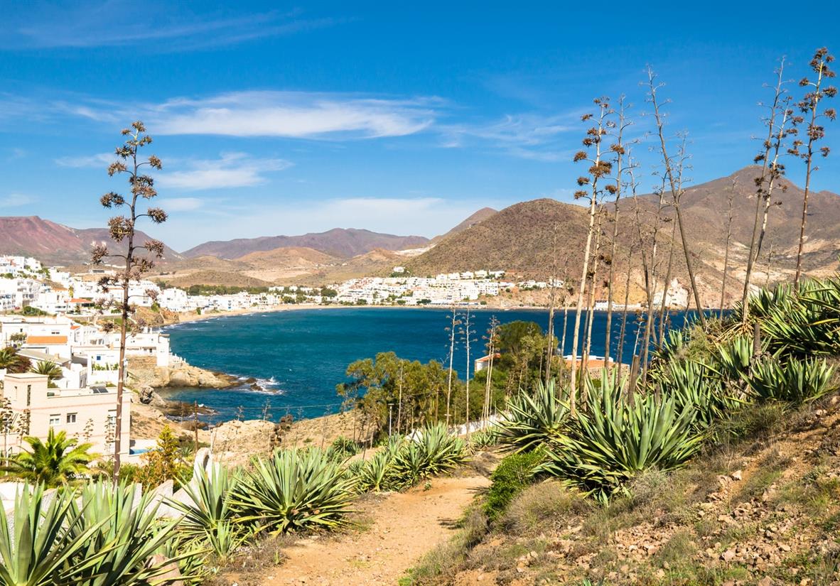 Whitewashed villages backed by desert landscapes