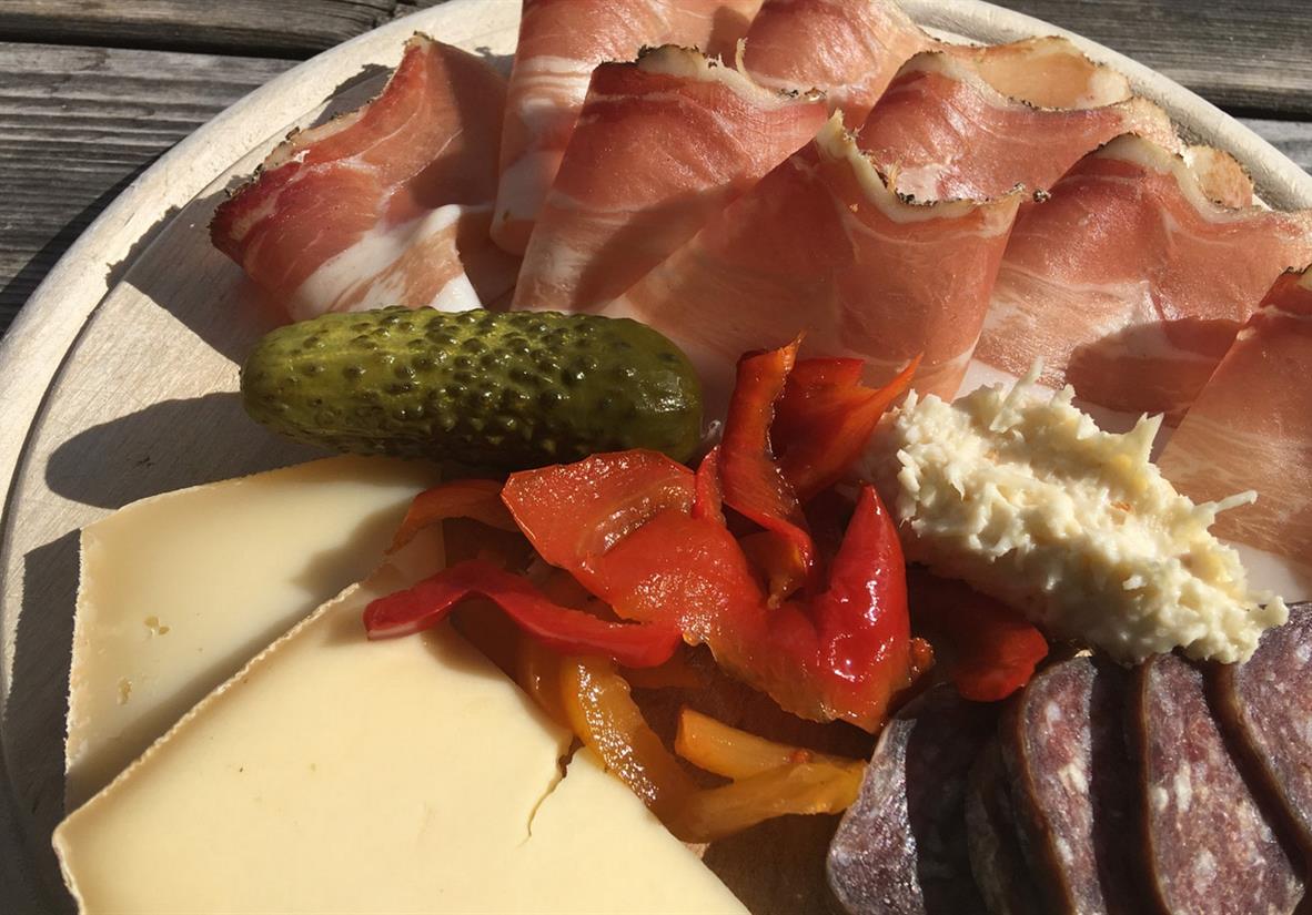 Sample some of the local meats and cheese
