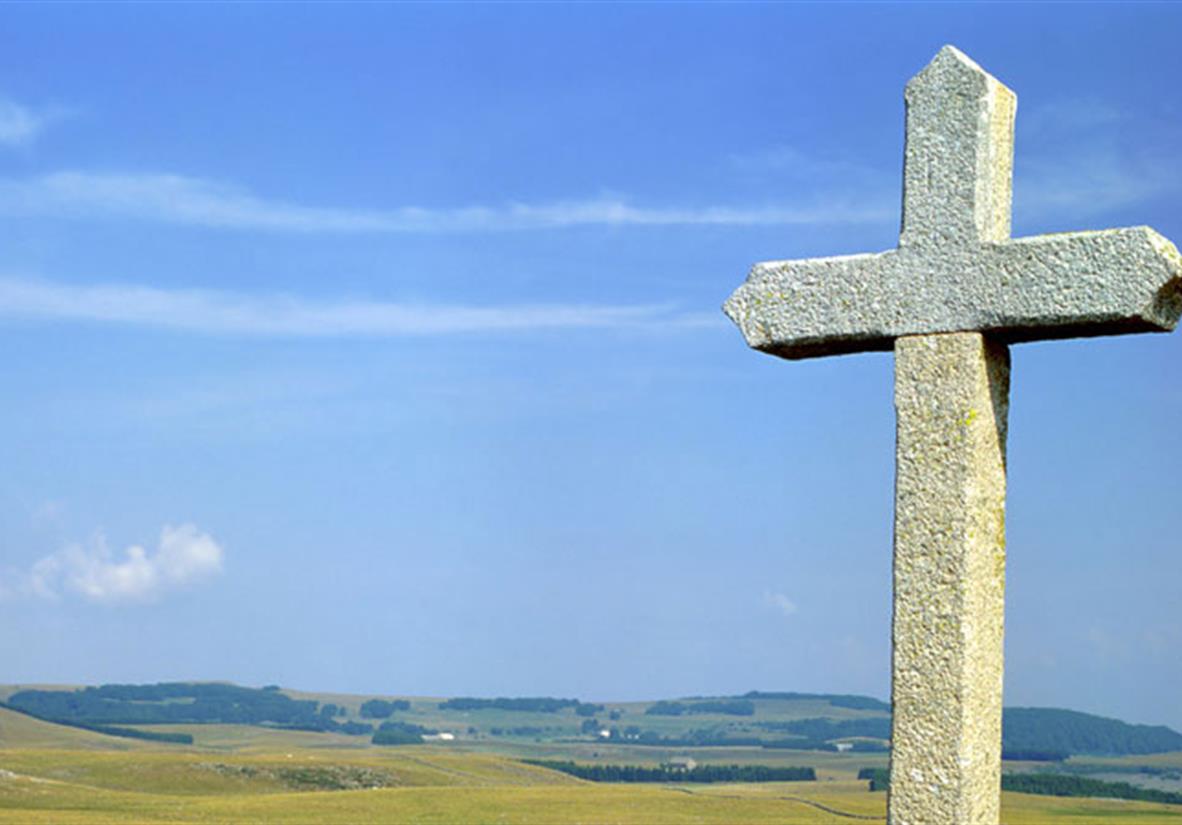 Ancient stone cross en route