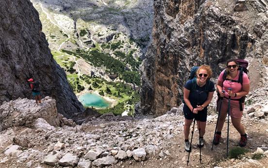 Hikers above lake Lagazuoi
