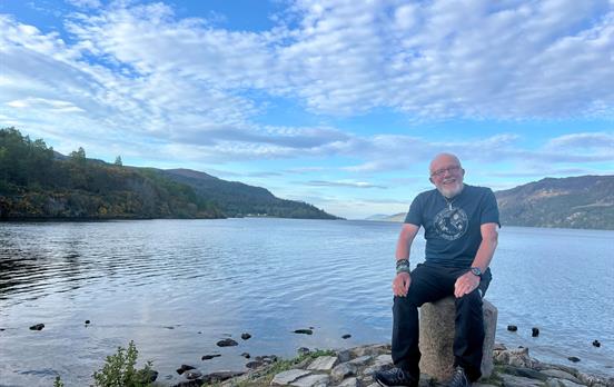 David sat on the shores of Loch Ness