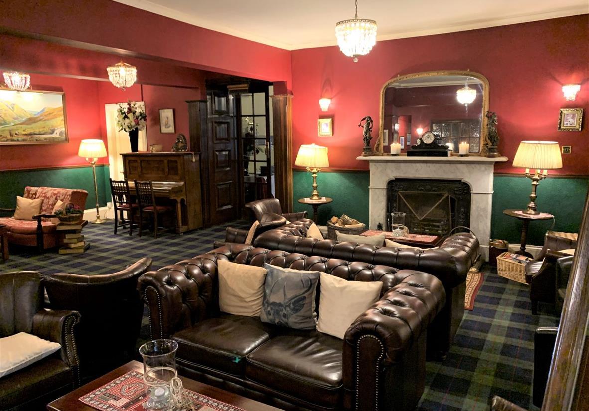 Cosy up by the fire in the Atholl Arms with a pint