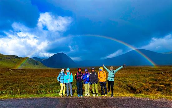 Group of walkers in rainbow