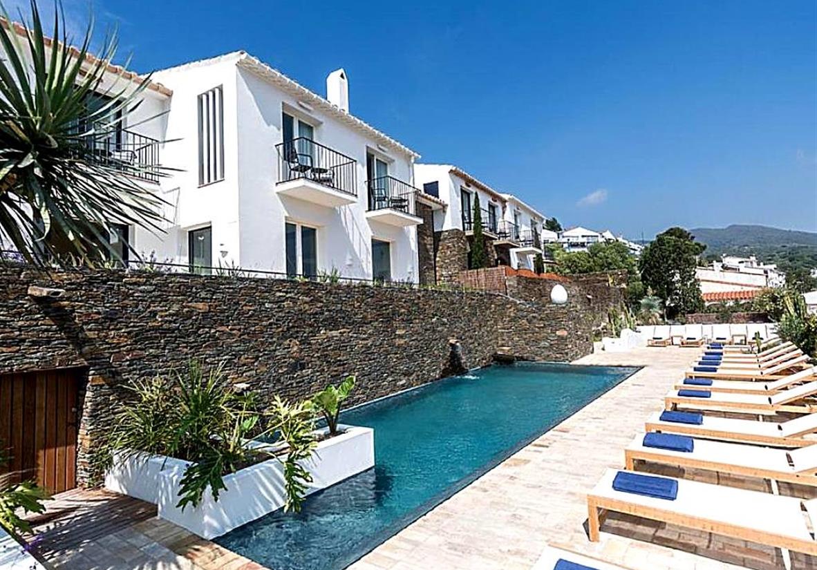 Relax by the pool at the Boutique Hotel Villa Gala
